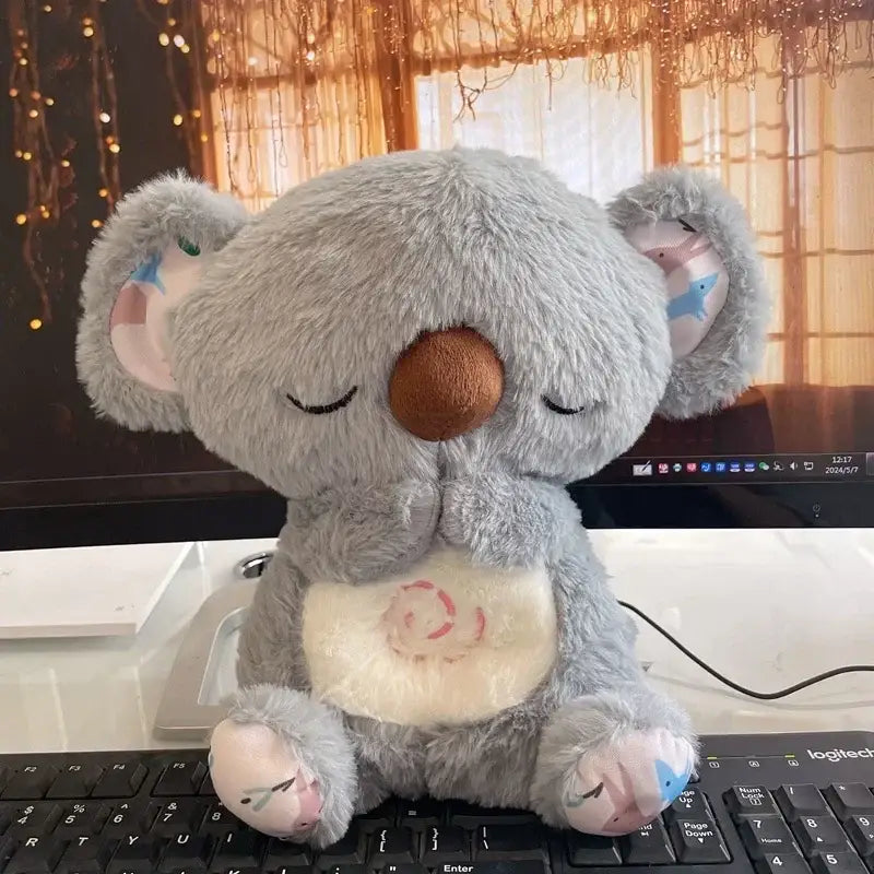 https://playfulcreations.store › products › breathing-koala-plush-toy