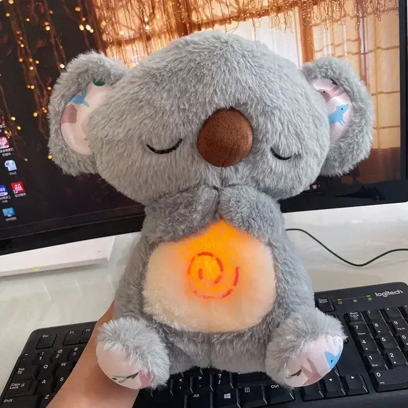 https://playfulcreations.store › products › breathing-koala-plush-toy