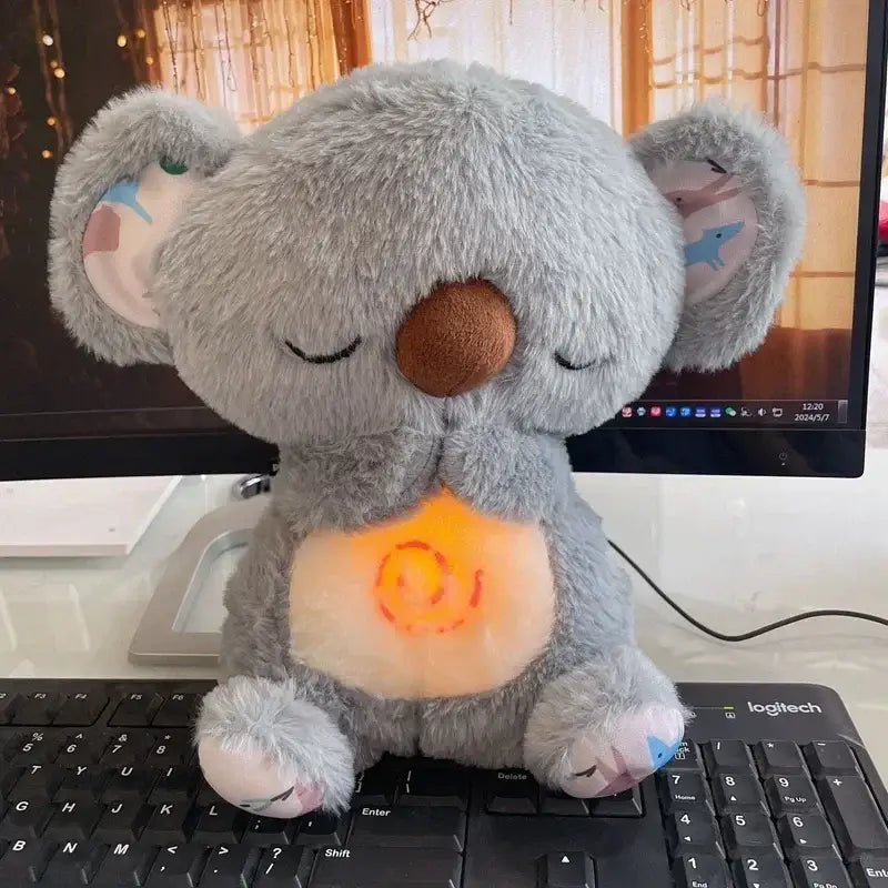 https://playfulcreations.store › products › breathing-koala-plush-toy