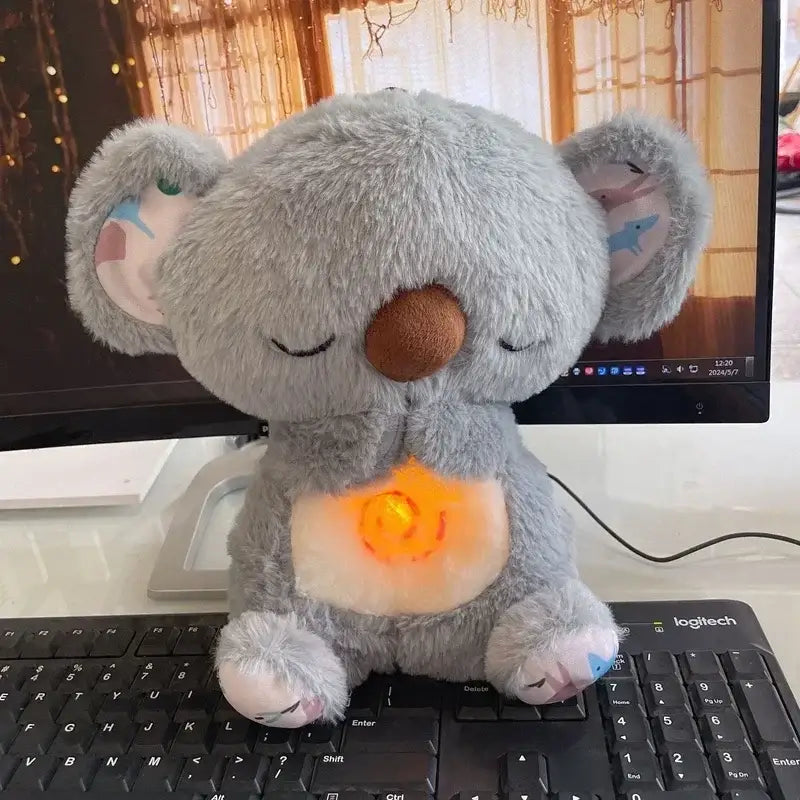 https://playfulcreations.store › products › breathing-koala-plush-toy